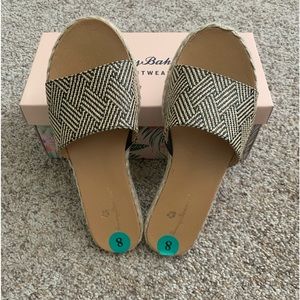 Brand new Woman’s slip on sandals .